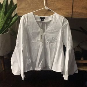 Bell-sleeved white blouse